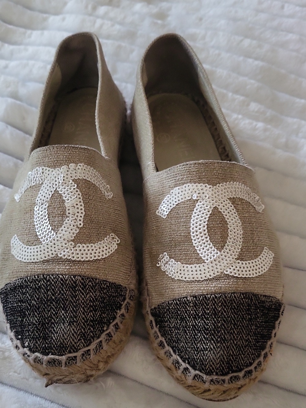 Chanel beige canvas espadrilles featuring a white sequin CC logo Shoes